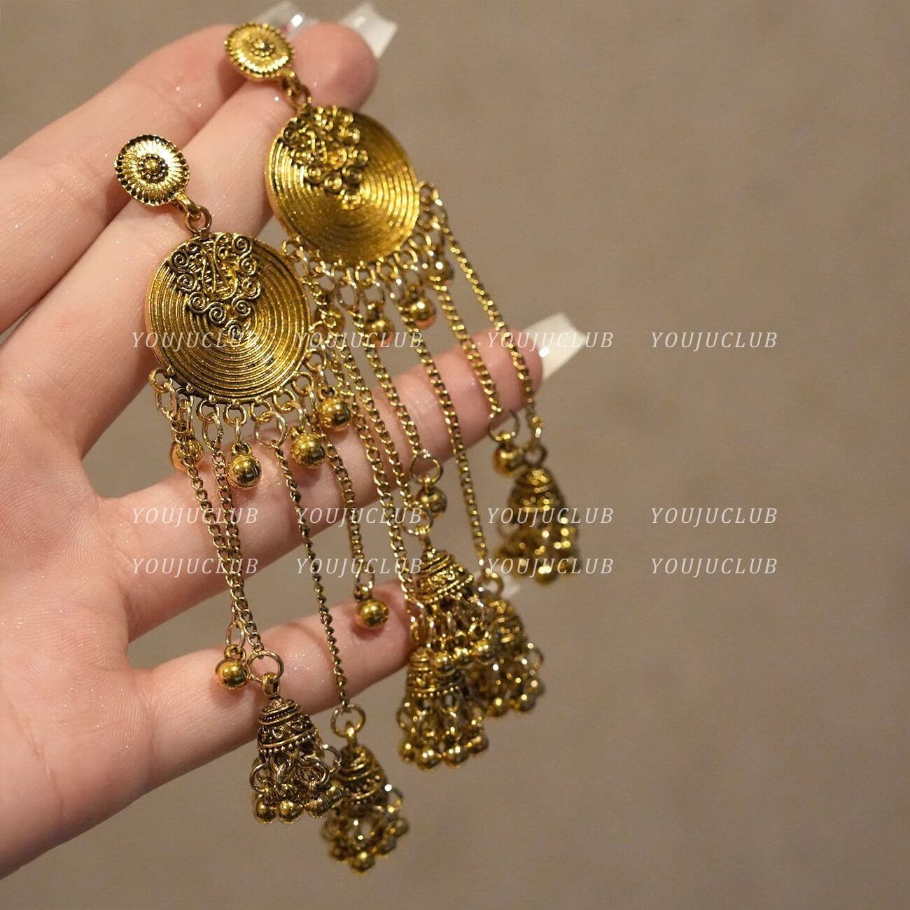 Luxury Boho Dangle Clips | Vintage Floral Ear Cuffs
Gold Fringe Ear Clips | Bohemian Statement Jewelry
Floral Ear Cuffs | Retro Gold Dangle Jewelry
Vintage Boho Earrings | Non-Piercing Ear Clips
Ethnic Gold Ear Jewelry | Chic Fringe Cuffs